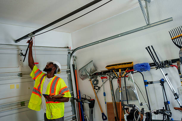Professional Garage Door Panel Replacement technician working in Central City, IA